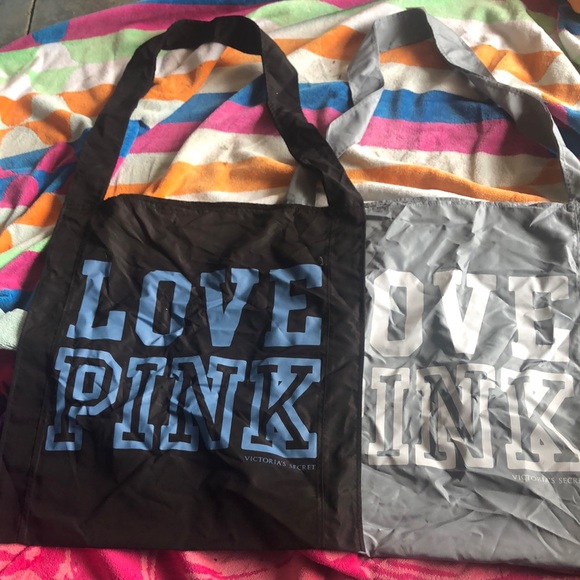 2 VS. pink bags.